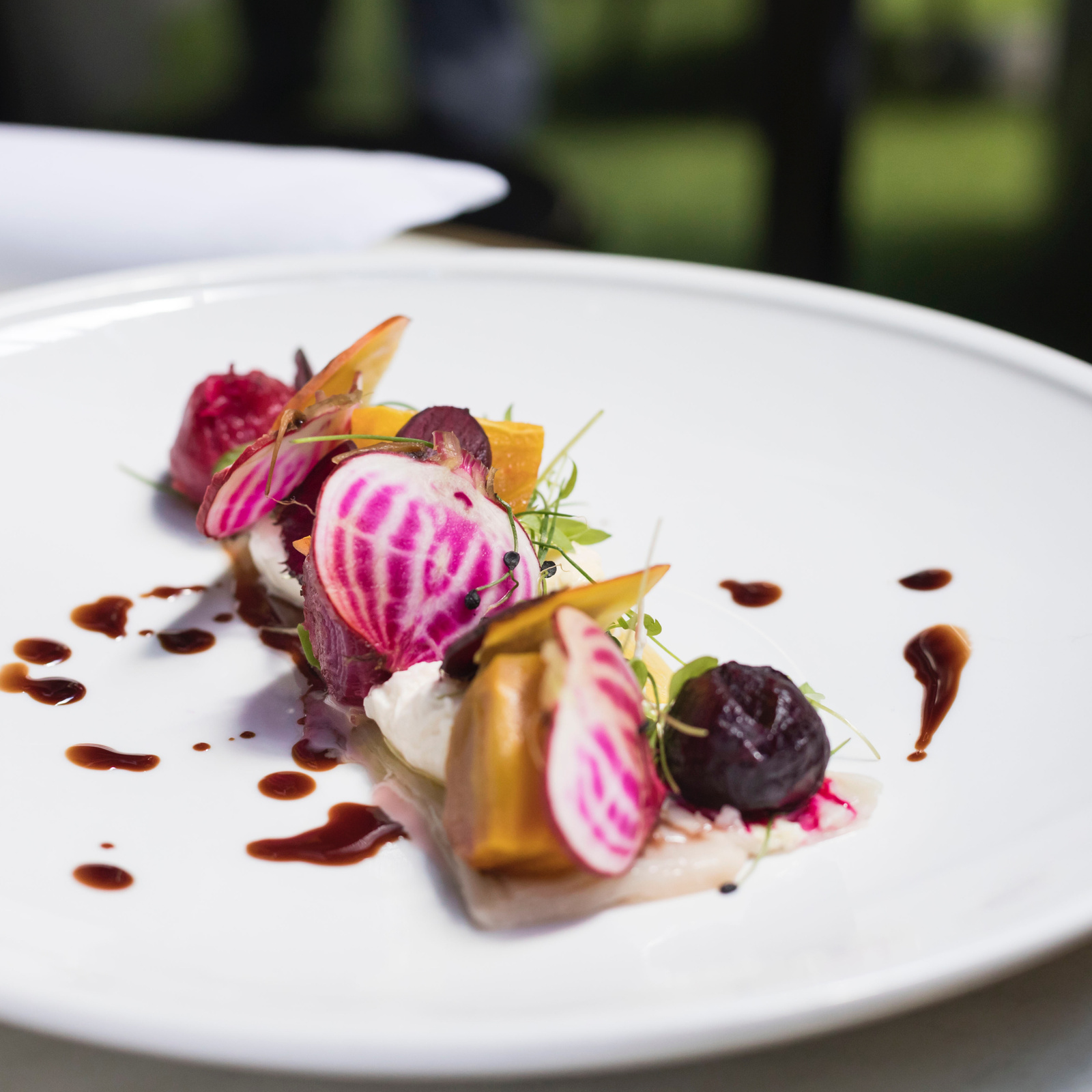 Appetizing dish with beet on plate in restaurant